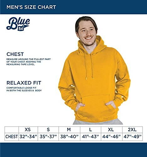 Men's size chart with a model wearing a yellow hoodie.